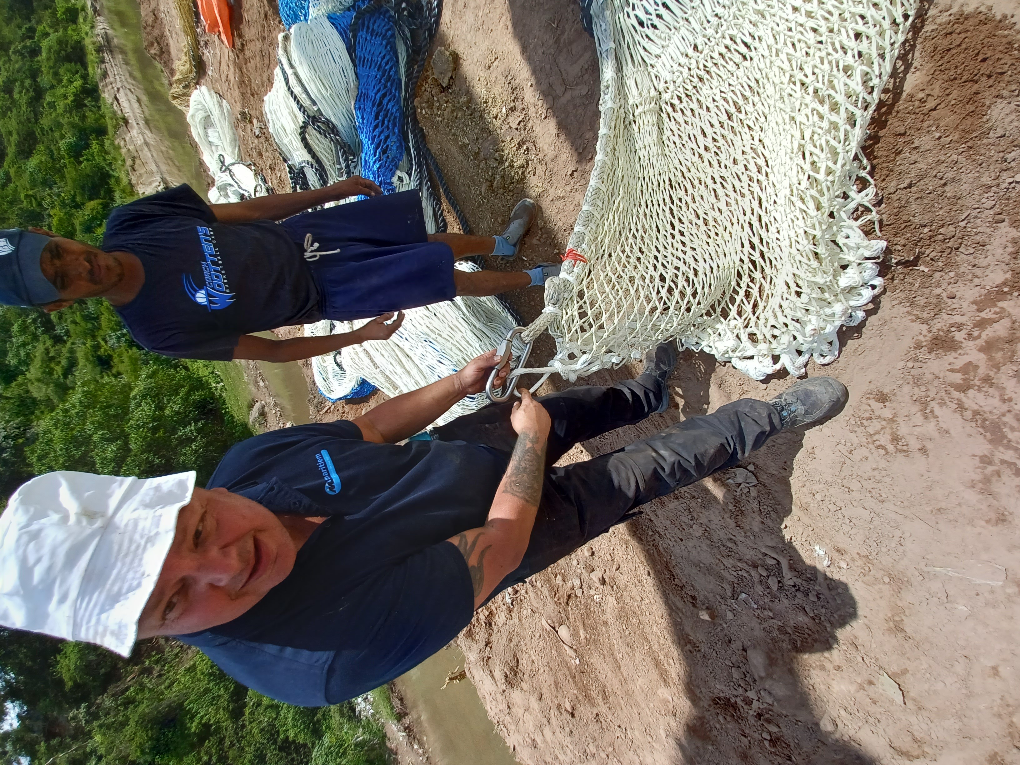 Leen Imthorn, Engineer of Maritiem, installing the barrier